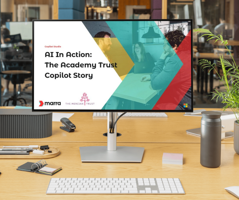 Desktop screen in an office with showing AI in Action webinar